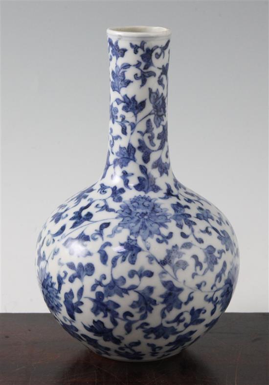 A Chinese blue and white lotus bottle vase, Yongzheng mark, 19th century, 21cm, neck restored